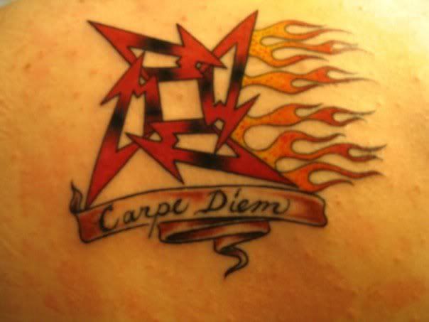 I actually have the metallica star on my back with the words carpe diem